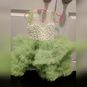 Customized baby dress with a train. Baby wore once for a photoshoot